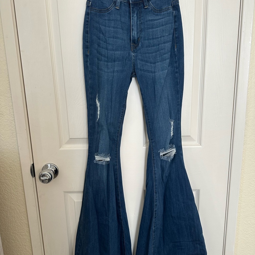 Vibrant Distressed Flare Jeans in Deep Blue